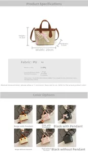 Detail of PU leather bucket bag with brand embossing and pearl heart lace charm