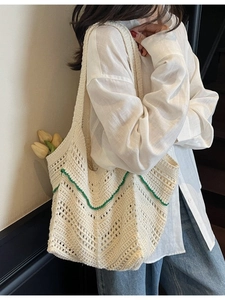 Handmade cream crochet tote bag with green wavy trim for beach vacations and daily use