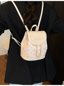 Chic cream mini backpack with bear prints and gold chain detail for women