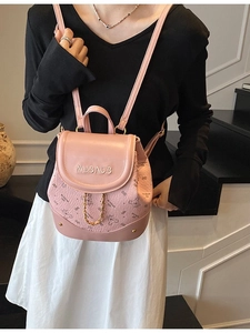Pink mini faux leather backpack for women featuring cute bear prints and gold chain detail