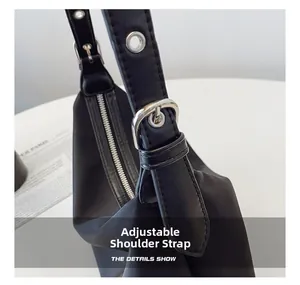 Macro shot of adjustable leather strap with silver eyelets and high-density nylon fabric