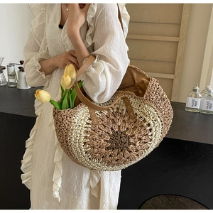 Detail of sunflower crochet pattern on handcrafted paper rope beach tote bag