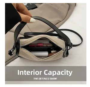 Top view of beige knit crossbody bag showing internal capacity with phone and lipstick
