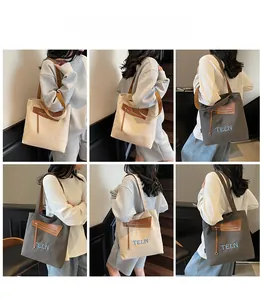 Vues multiples d'un grand sac cabas en toile avec lettrage TELN et pompons décoratifs