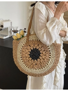Handmade woven sunflower straw beach bag with leather straps and round hollow design