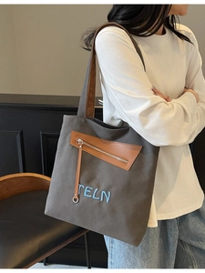 Sac cabas en toile gris foncé avec empiècement cuir marron et broderie TELN