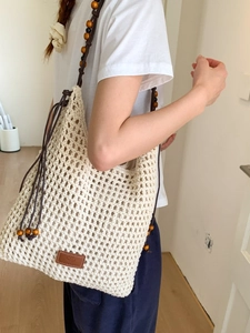 Bohemian hollow woven beach tote with wooden bead straps and large capacity