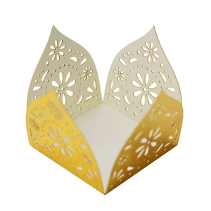 Detailed laser-cut daisy hollow pattern on cream and yellow cardstock wedding favor box