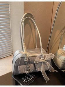 Metallic silver saddle bag with pleated texture, lace bows and heart charms