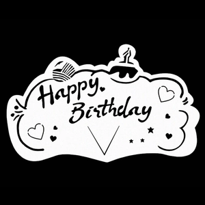 Detail of Happy Birthday sticker with hand-drawn cake and hearts on black background