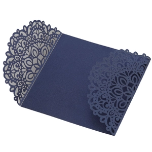Navy blue laser cut lace wedding invitation cover in elegant floral kraft paper design