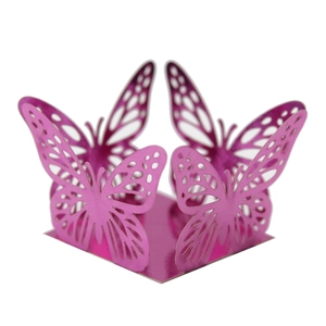 Detailed laser-cut hollow butterfly candy box in vibrant rose purple with metallic finish