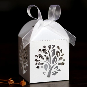 White laser cut tree favor box with ribbon for weddings and festive party favors