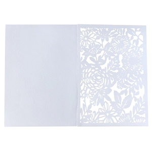 Pure white laser cut floral invitation cover with intricate rose leaf patterns