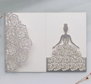 Detail of laser-cut rose floral lace and glitter silhouette on luxury paper card