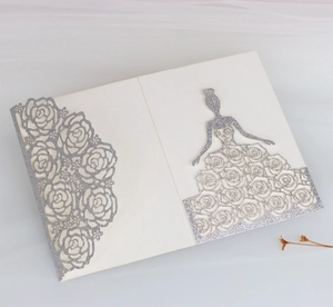 Macro view of laser-cut glitter rose invitation card with elegant girl silhouette