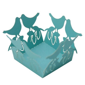 Teal laser cut paper favor box featuring hollow bird motifs for wedding decorations