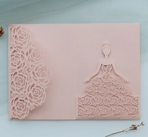 Detail showing pink laser-cut rose patterns and elegant girl silhouette on the card