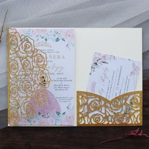 Detailed laser cut rose pattern on gold glitter wedding invitation with floral inserts
