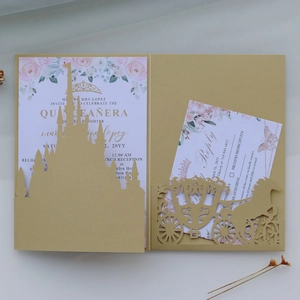 Detailed laser-cut gold castle and carriage invitation set for Quinceañera and weddings