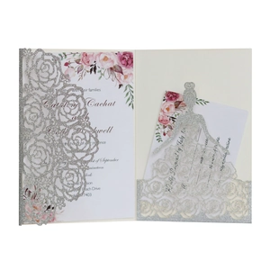 Silver glitter laser cut rose wedding invitation with floral insert and dress-shaped pocket