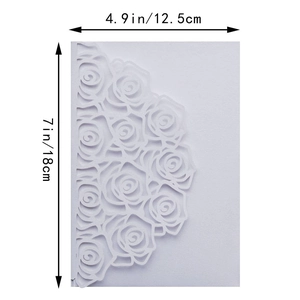 Detailed laser-cut white rose wedding invitation sleeve measuring 18x12.5 cm