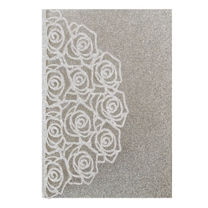Detailed laser-cut rose hollow pattern and silver glitter texture on invitation card