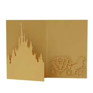 Detailed laser-cut gold castle and horse carriage pop-up wedding invitation card