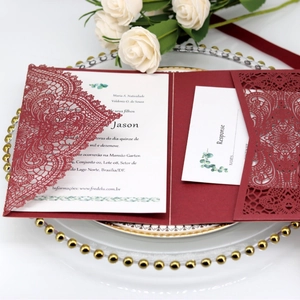 Laser-cut lace wedding invitation set with hollow red cover and white cards