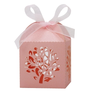 Detailed laser-cut tree pattern on pink pearlescent paper gift box with a white ribbon bow