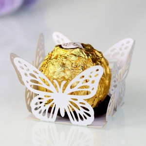 Detailed laser-cut white butterfly chocolate wrapper for wedding and party favors