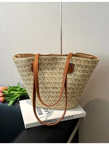 Grande borsa tote in paglia intrecciata con manici in pelle marrone per ufficio e mare