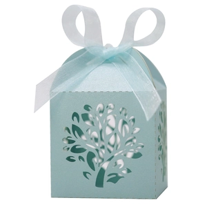 Detailed laser-cut tree design on light blue candy box with organza ribbon bow