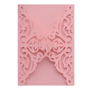Pink laser-cut invitation card with elegant floral scroll patterns for weddings and baptisms