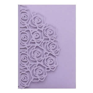 Detailed laser-cut rose pattern on light purple pearlescent paper wedding invitation cover