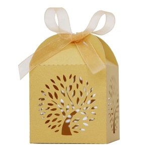 Laser cut Tree of Life wedding candy box in gold paper with a matching organza ribbon bow
