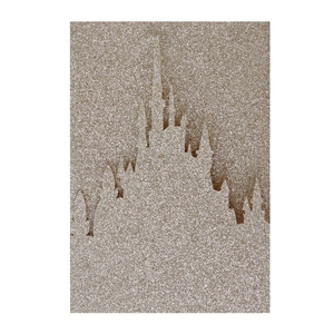 Detailansicht von champagnergoldenem Glitzerkarton mit ausgeschnittenem Schlossdesign