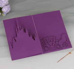 Detailed laser-cut purple castle and carriage invitation card for weddings or events