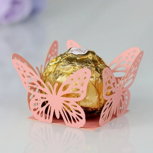 Detailed laser-cut pink butterfly candy box for weddings with delicate hollow lace patterns