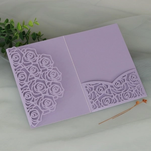 Lavender laser-cut rose invitation card cover with inner pocket on romantic mesh background