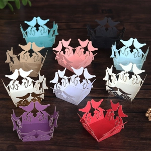 Laser cut paper favor boxes with hollow bird design in various vibrant pearlescent colors