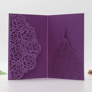 Detailed laser-cut purple invitation featuring delicate rose patterns and a female silhouette