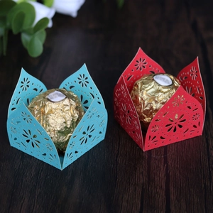 Detailed laser cut lace candy boxes in sky blue and red for weddings and holiday parties