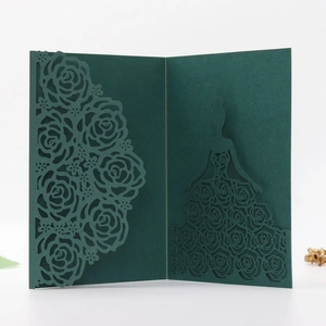 Detail of dark green laser-cut rose hollow pattern and elegant female silhouette card