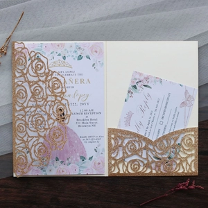 Detail of laser-cut gold glitter rose invitation with RSVP card for weddings and events