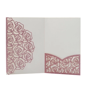 Detail of pink glitter laser-cut rose hollow pocket for wedding invitations