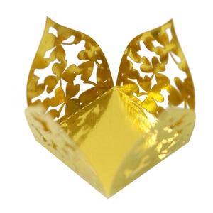 Elegant gold laser-cut clover candy boxes for wedding parties and festive gift packaging