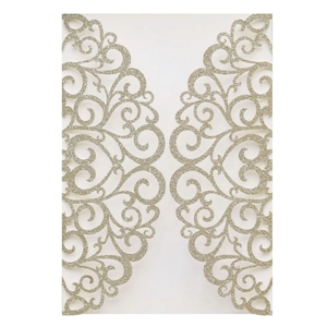 Close-up of laser-cut heart pattern on gold glitter wedding invitation cover sleeve