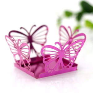Detailed laser-cut butterfly hollow pattern on glossy pink wedding favor box decoration