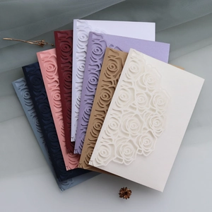 Laser-cut rose hollow wedding invitations in seven pearlescent colors with elegant textures